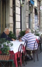 Italians chatting in a cafe