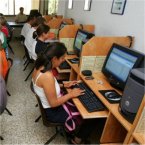 Students working on computers in Malaga
